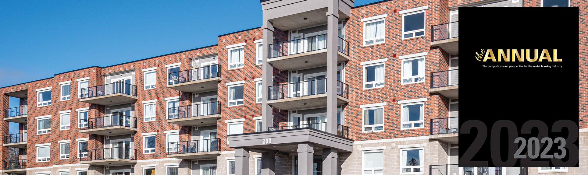 Exterior of an apartment building with badge overlay, reading “Top 10 REITs in Canada”