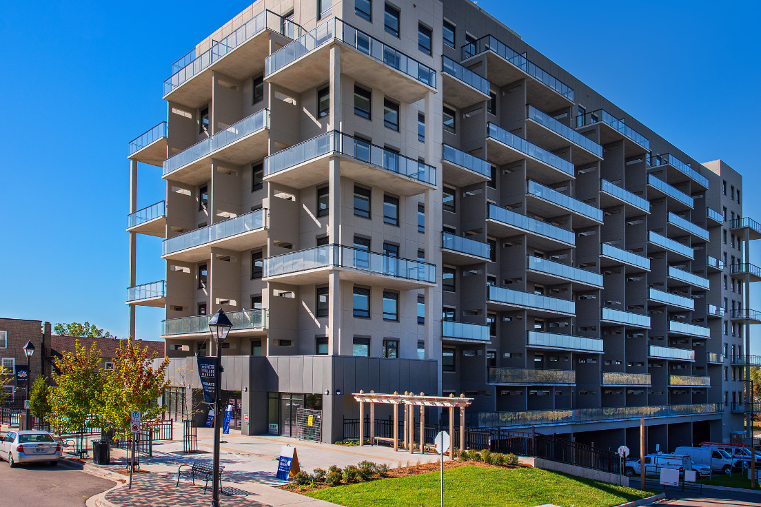 Exterior of an apartment property at 49 Queen Street East in Cambridge, Ontario.