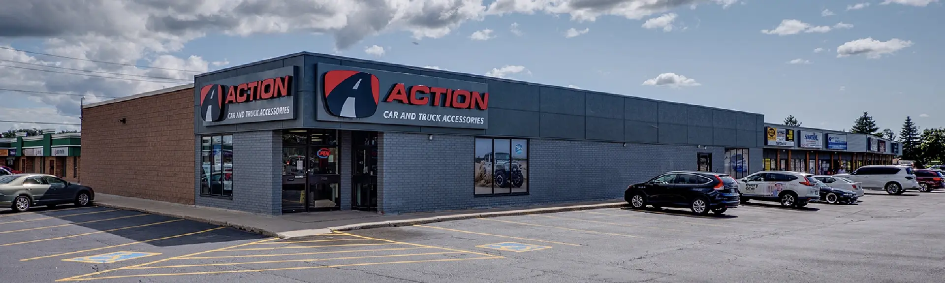 Exterior of a multi-tenant retail-industrial building in Barrie, ON.